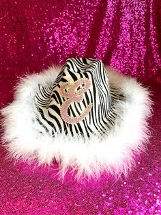 Zebra print cowboy hat Be the best dressed at the rodeo Size: One size fits all Personalised with you chosen initial  A Hen party, Festival or fancy dress party necessity  The perfect party essential Cowgirl chic!  The hat dimensions Inside head space: 18cm x 21cm Height: 14cm Hat width with brim: 29cm x 36cm Brim alone : 8cm Western White Costume Hats And Headpieces For Summer, White Western Costume Hats And Headpieces For Summer, White Western Mini Hats For Country Events, Western Style Fedora For Summer Party, Western Summer Party Fedora, Western Style Summer Fedora For Party, Western Style Summer Party Fedora, Western Wide Brim Fedora For Party, Western Mini Hat For Kentucky Derby