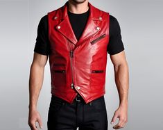 Hand Crafted 100% Genuine Cow Leather ♣ PRODUCT INFORMATION: This Handmade Men Handmade Biker Vest Red with: --> Turn down collar, --> Button closure, --> 1 breast zipper pocket, --> 2 waist pockets, --> Double stitched for more durability, --> Full satin lining for more comfort, --> Beautiful Construction and design, --> Genuine leather is our guarantee. ♣ Measurements Required: 🔸Actual Body Chest 🔸Cross Shoulder 🔸 Waist (measured from where you button up your pant) 🔸 Length (length you wan Red Biker Leather Jacket For Motorcycling, Red Biker Jacket For Motorcycling, Red Punk Biker Jacket For Biker Events, Punk Red Biker Jacket For Biker Events, Red Leather Biker Jacket, Edgy Red Biker Jacket For Biker Events, Edgy Red Outerwear For Biker Events, Steampunk Vest, Motorbike Leathers