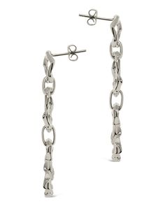 You don't want to blend in, and these bold drop earrings will help you stand out! These feature a trio of organic molten links that secure with a sturdy post back. Available in gold and silver tones. Materials: 14K gold or rhodium plated brass Features: 2" drop, 0.45" width, 0.4" stud, Lead & Nickel free, post back Modern Oval Link Metal Earrings, Modern Earrings With Polished Oval Link, Modern Oval Link Earrings With Polished Finish, Modern Link Shaped Metal Earrings, Modern Dangle Earrings With Hook And Links, Tarnish Resistant Silver Chain Link Earrings, Modern Sterling Silver Link Earrings, Modern Sterling Silver Tarnish Resistant Linear Earrings, Modern Metal Earrings With Hook Style