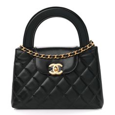 This is an authentic CHANEL Shiny Aged Calfskin Quilted Nano Kelly Shopper in Black. This mini bag is a twist on an archival Chanel bag, featuring a long crossbody chain strap. This dual top handle bag is quilted in shiny aged calfskin leather in black, accented by aged gold hardware, including a Chanel CC turn-lock at the flap. This opens to a compact black leather interior with zipper and flat pockets. Chanel Kelly Bag, Archival Chanel, Chanel Top Handle Bag, Chanel Kelly, 2025 Wishlist, Chanel Mini Bag, Chanel Top, Chanel Mini, Kelly Bag