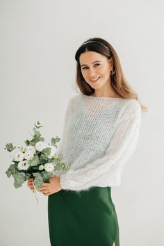 "Mohair sweater is a unique piece for a cold wedding day that will keep you warm and make your look magical. A completely weightless wedding sweater, wraps you in a warm cloud. This is the perfect solution for autumn and spring, will make your look feminine and light. The pattern is so interesting that you will not go unnoticed. A warm and soft bridal sweater is perfect for stylish minimalist dresses, as well as for fluffy lace dresses of different styles. The sleeve of the mohair sweater is ado Winter Wedding Mohair Sweater, Elegant White Knitted Sweater, White Long Sleeve Wedding Sweater, White Wedding Sweater For Winter, White Winter Wedding Sweater, Elegant White Mohair Sweater, White Wool Sweater, Wedding Sweater, Bridal Sweater