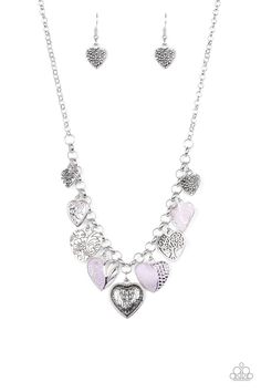 Featuring an array of floral patterns, a collection of silver hearts swings from the bottom of a shimmery silver chain. Alternating charms are brushed in a minty green finish, creating a colorful fringe below the collar. Features an adjustable clasp closure. Sold as one individual necklace. Includes one pair of matching earrings. Get The Complete Look!Bracelet: "Garden Hearts" (Sold Separately) Purple Accents, Purple Necklace, Charm Necklace Silver, Silver Heart Necklace, Paparazzi Accessories, Paparazzi Jewelry, Short Necklace, Love Necklace, Floral Patterns