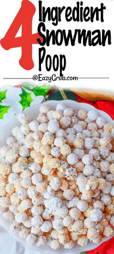 a bowl full of snowman popcorn on top of a table