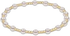 You will fall in love with this classic sincerity pattern 4mm bead bracelet with pearl! This bracelet is a classic gold beaded bracelet with alternating bead sizes. The larger bead size is a 4mm crystal pearl and the smaller bead size is a 2mm. Made with 4mm crystal pearls, and 2mm 14kt gold-filled beads Worry-free wear‚ which means sleep, shower and sweat in it Hand beaded on high performance elastic for a slight stretch to easily roll on and off your wrist Measures 6.25" Stacks well with all b Gold Beaded Bracelet, Bead Sizes, Gold Bead Bracelets, Classic Gold, Crystal Pearls, Hand Beading, 14kt Gold, Bead Bracelet, Gold Beads