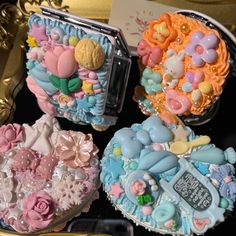 three different shaped cookies sitting on top of a table