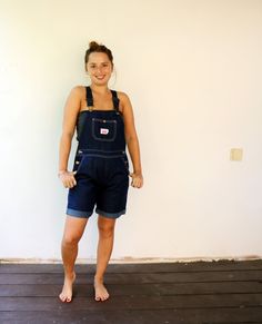 "Vintage denim short Cutoffs overalls in dark blue, cotton, buttons on each side, adjustable straps, pockets, high waist fit. original tag intact, the length has been cutoffs. aside from minor signs of wear, good vintage condition. clean ready to wear. Model is 5′ 0.2″ - 153cm and size XS-S for reference ** Approximate size:S- please refer to the measurements M E A S U R E M E N T S - were taken with garments laying flat, please double where necessary. ------------------------♥-------- length:33 Cotton Overalls With Pockets In Short Length, Short Cotton Overalls With Pockets, Cotton Short Overalls With Pockets, Dark Wash Cotton Shortalls With Pockets, Medium Wash Short Length Overalls With Pockets, Short Length Medium Wash Overalls With Pockets, Retro Cotton Dark Wash Shortalls, Retro Dark Wash Cotton Shortalls, Medium Wash Short Length Cotton Overalls