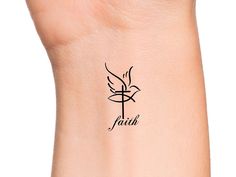 a woman's wrist with the word faith on it and a bird tattoo design