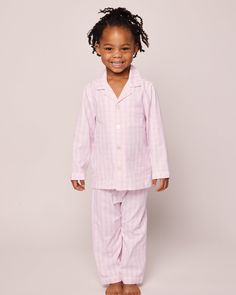 This pajama set is classic and never goes out of style. Gingham print dating back to the 17th century is a staple. This classic pajama set is accented with white piping and finished with pearl buttons. The sleepwear is made from the finest quality yarn-dyed cotton and blended with just enough inherently flame retardant fiber to allow it to pass strict CPSC flame retardant laws without using harmful chemicals. The fabric is brushed for added softness, making the sleepwear feel absolutely luxuriou Classic Sleepwear For Pajama Party In Spring, Classic Spring Sleepwear For Bedtime, Classic Cotton Sleepwear For Pajama Party, Gingham Sleepwear For Bedtime In Spring, Classic Long Sleeve Pajama Party Sets, Gingham Pajama Set, Gingham Cotton Sleepwear For Sleepover, Gingham Sleepwear For Spring Bedtime, Spring Gingham Sleepwear For Bedtime