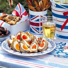 a table topped with lots of food and drinks