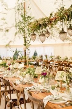 the tables are set with place settings for dinner