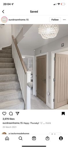 an instagramted photo of someone's house with stairs leading up to the second floor