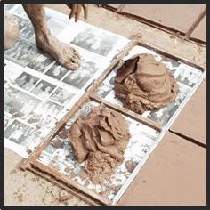 the mud is being spread on top of the tile to make it look like they have been