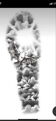 a black and white photo of birds flying in the sky with clouds behind them on a cell phone screen