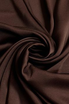 Distinguished by its luxurious design, our high-quality Triacetate Satin Backed Crepe in Chocolate fabric is perfect for evening wear, skirts, blouses, pants, shirts, jackets. Originally made in Japan, this exceptionally versatile fabric is the perfect choice for your next projects. Our unique and distinctive fabric is available in a wide selection of colors. Purchase high-quality Triacetate Satin Backed Crepe fabric by the Yard at NY Designer Fabrics. Luxurious Design, Crepe Fabric, Satin Fabric, Fabric By The Yard, Evening Wear, Made In Japan, Halloween Shopping, Fabric Design, Blouses