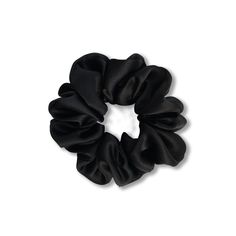 The LBD of hair accessories! A must-have for everyday and special occasions alike. Perfect for walking up Fifth Avenue at 6 with your coffee and a croissant. Buttery one-hundred percent silk charmeuse in black. Wraps around a ponytail 1-2 times depending on hair thickness, typically once for thick-medium hair and twice for fine hair! Constructed with 100% biodegradable 1/2" elastic made from certified organic cotton and natural rubber. Sewn shut by hand.  The Golightly is approximately 4" (10.2 Black Silk Scrunchie, Bag Tour, Black Hair Tie, Black Scrunchies, Black Scrunchie, Thick Hair Styles Medium, Black Hair Clips, Hair Thickness, Henna Tattoo Designs Simple