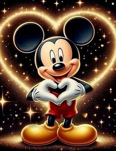 the mickey mouse is standing in front of a heart with stars and sparkles on it