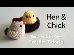 two crocheted chickens sitting next to each other