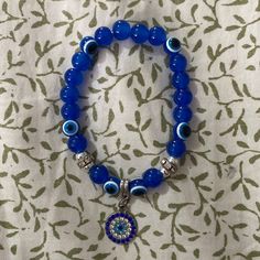 Blue Evil Eye Bracelet. Never Used. Evil Eye Bracelet Ideas, Blue Evil Eye Bracelet, Blue Evil Eye, Bracelet Ideas, Eye Bracelet, Evil Eye Bracelet, Womens Jewelry Bracelets, Evil Eye, Black Blue