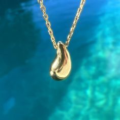 Showcase you love of water with our stunning and modern Wai Raindrop pendant. Water is life in Hawaii and this beautifully designed pendant is sure to add elegance and sophistication to any outfit. .925 Sterling Silver Approx. 1/2" Tall Available in 14K Gold Plated or Silver Includes 18" Adjustable chain w/1" extension Minimalist Polished Drop Jewelry, Everyday Teardrop Jewelry With Shiny Finish, Minimalist Drop Jewelry With Polished Finish, 14k Gold Teardrop Jewelry With Polished Finish, White Gold Drop Jewelry With Shiny Finish, Modern Tarnish-resistant Drop Gift, Teardrop Shaped Jewelry With Shiny Finish For Anniversary, Drop Shaped Jewelry With Shiny Finish For Gifts, Polished Finish Yellow Gold Drop Earrings As Gift