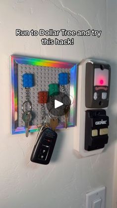 a wall mounted lego key holder with keys attached to it and the words run to dollar tree and try this hack