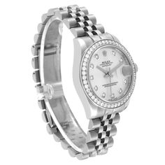 Rolex Datejust Midsize Steel White Gold Diamond Ladies Watch 178384. Officially certified chronometer automatic self-winding movement. Stainless steel oyster case 31.0 mm in diameter. Rolex logo on the crown. 18K white gold bezel set with original Rolex factory diamonds. Scratch resistant sapphire crystal with cyclops magnifier. Silver dial with original Rolex factory diamond hour markers. Date calendar at 3 o'clock aperture. Stainless steel jubilee bracelet with hidden clasp. Fits 6.5" wrist. Date Calendar, Rolex Logo, Rolex Gmt, 3 O Clock, Ladies Watch, Rolex Datejust, Swiss Watches, Luxury Watch, Sapphire Crystal