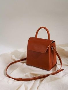 - Simple design- Squared shape bag- Vegetable cow leather- Detachable strap- Magnet closure- Both type of tote bag and shoulder bagMeasurement- Width: 6.5- Height: 6.1- Depth: 2.53.9- Strap length: 42.1~50Composition & Care- 100% Vegetable cow leather(from Italy)- Brass, MetalDesigner- Imported- by TONE STAINED- Style#: 300503595 Chanel Handbags Pink, Chanel Handbags Tote, Chanel Handbags Classic, Photography Bags, Cheap Purses, Chanel Cruise, Popular Handbags, Diane Kruger, Cute Handbags