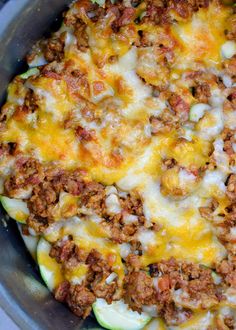 a casserole dish with meat and cheese on top