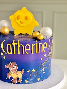 there is a cake that says catherine on the top and bottom with stars around it