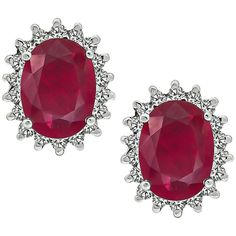 This is a charming pair of 14k white gold earrings. The earrings feature lovely oval cut Burmese rubies that weigh approximately 3.50ct. The rubies are accentuated by sparkling round cut diamonds that weigh approximately 0.70ct. The color of of these diamonds is H with VS clarity. The earrings measure 11mm by 9mm and weigh 3.2 grams. Inventory #19913ESS Burmese Ruby, White Gold Earrings, Burmese, Round Cut Diamond, Myanmar, Jewelry Earrings Studs, Oval Cut, Beautiful Jewelry, Gold Earrings