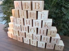 a stack of wooden blocks sitting on top of a table