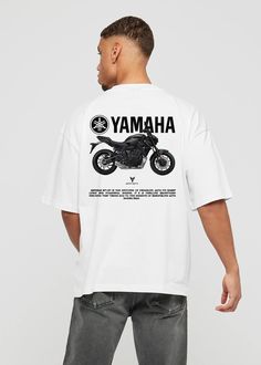 Yamaha MT-07 Oversized T-Shirt Description: Express your passion and style with this specially designed Yamaha MT-07 oversized t-shirt for motorcycle enthusiasts! Featuring sleek and modern lines that capture the dynamism of the Yamaha MT-07, this t-shirt also stands out for its comfort and quality. Features: Design: Print that reflects the iconic design of the Yamaha MT-07 Fit: Oversized fit for a relaxed and roomy look Sizes: Available in sizes from S to 2XL Material: 100% cotton fabric, soft White Short Sleeve T-shirt For Motorcycling, White Moto Crew Neck T-shirt, White Moto Style Short Sleeve T-shirt, White Short-sleeved Moto T-shirt, White Short Sleeve Moto T-shirt, White Moto Top With Graphic Print, White Short Sleeve T-shirt For Biker Events, White Moto T-shirt For Streetwear, Sporty Short Sleeve T-shirt For Motorcycling