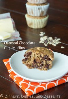 an oatmeal chocolate chip muffin is on a plate next to some cupcakes