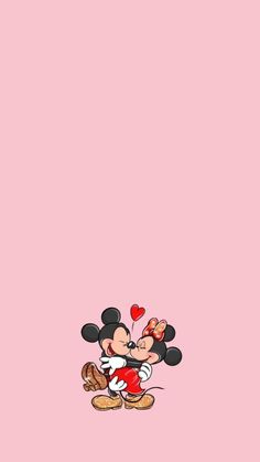 mickey and minnie mouse wallpaper with hearts on it's ears, in front of a pink background