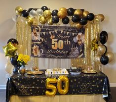 a 50th birthday party with balloons and decorations