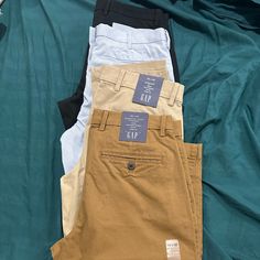 Four Pairs Of Relax Fit/Casual Pants (Unisex Bundle) Brand: 3 (The Gap) X 1 (Uni Qlo) Condition: Brand New/Excellent Size: 30 X 30 (Waist X Length) Colors: Tan (Gap), Black (Gap), Brown (Gap) & Sky Blue (Uni Qlo) A Small Spot On The Uni Qlo Pant. Not Noticeable In Pics. Gap Cotton Chinos With Pockets, Gap Cotton Chinos For Work, Gap Cotton Wide Leg Bottoms, Gap Casual Chinos For Work, Casual Gap Chinos For Workwear, Gap Casual Workwear Chinos, Gap Bottoms With Pockets Long Pants, Classic Gap Pants For Spring, Gap Cotton Bottoms