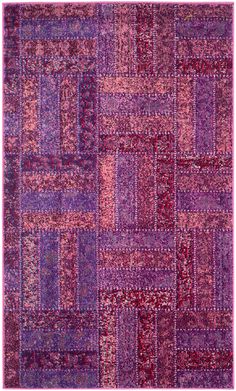 an area rug with many different colors and patterns on the carpet, including pinks, purple