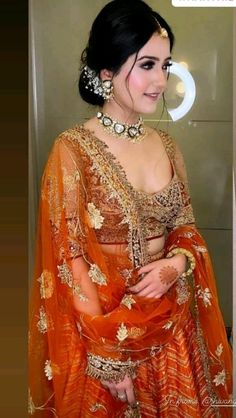 This amazing lehnga idea for all the beautiful bridesmaid... with fresh makeup look Actress In Lehenga, Luxurious Lehenga, Bride's Sister, Fresh Makeup Look, Brides Sister, Orange Lehenga, Indian Bride Makeup, Cinderella Movie