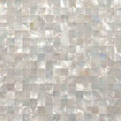 an image of a white tile wall that looks like it is made out of mother of pearl