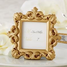 PRICES MAY VARY. Elegant Design: Beautifully detailed gold baroque frame made of resin with a matte-gold finish. Perfect for adding a touch of class to any event. Multiple Uses: Ideal for wedding registry, wedding decor, guest gifts, and table assignment. Can also be used as a stunning table number holder. Perfect Size: Each frame measures 4" h x 3.5" w, making it the ideal size for place cards or photos. Fits seamlessly on reception tables. Includes Place Cards: Convenient coordinating place ca Gold Place Cards, Baroque Wedding, Mini Picture Frames, Place Card Holders Wedding, Wedding Thanks, Place Card Holder, Card Table Wedding, Wedding Card Holder, Gold Baroque