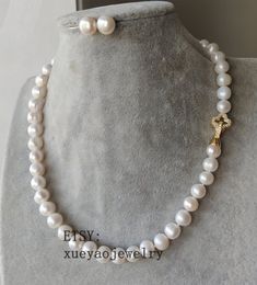 Welcome to my shop my dear friend. I hope you will like my jewelry, and most of my jewelry are made by myself. Please see the detail for this item:Pearl Jewelry: necklace & earringsmaterial: cultured freshwater pearlcolor: whiteSize: around 9-9.5 mmlength: can chooseif you want other length, can tell me please!About shipping:I will send out your order in 1-3 business days from China. 1, To United States, will use US E-packet shipping service , usually will 7-15 business days to finish delive Handmade Elegant Pearl Necklace For Mother's Day, Elegant Handmade Pearl Necklace For Mother's Day, White Pearl Jewelry Sets With Pearl Chain, White Pearl Necklace With Pearl Charm For Mother's Day, White Pearl Necklace With Round Beads For Mother's Day, White Pearl Jewelry For Mother's Day, White Pearl Necklace For Mother's Day, Elegant White Jewelry Sets For Mother's Day, Mother's Day White Pearl Jewelry