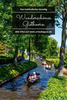 people are riding in small boats down the river with trees and grass on either side