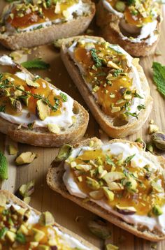 several pieces of bread with different toppings on them