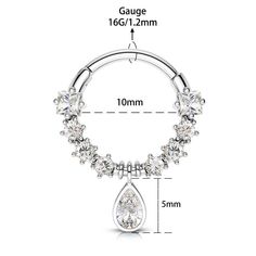 an image of a piercing ring with tear shaped crystal stones on the end, and measurements for