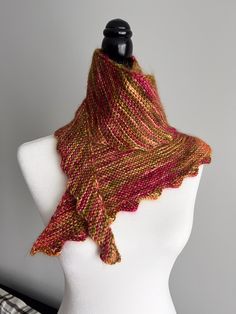 Introducing my handmade "Dragon Tail" (boomerang) scarf, a truly unforgettable accessory crafted from hand-dyed yarn by "Lychen and Lace." Every skein of yarn is unique, offering a one-of-a-kind color combination that makes your purchase special. The yarn is exceptionally soft to the touch and gentle on the skin, providing both warmth and comfort. I call it luxury yarn! Its bright red-orange hues, accented with subtle hints of green, makes this piece really a "Dragon Tail". The pattern of the bo Hand Knitted Alpaca Shawl Scarves, Bohemian Hand Knitted Alpaca Scarves, Handmade Mohair Shawl Scarf, Handmade Yarn Scarves One Size, Hand Knitted Alpaca Scarves, Handmade Alpaca Shawl One Size, Handmade Yarn Shawl Scarf, Handmade Yarn Shawl Scarves, Handmade Alpaca Shawl Scarf