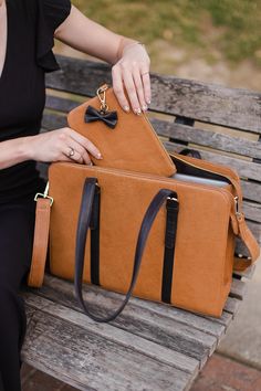 Chic Leather Laptop Bag With Luggage Sleeve, Chic Rectangular Laptop Bag With Luggage Sleeve, Elegant Travel Satchel With Laptop Sleeve, Elegant Laptop Bag With Card Slots For Work, Elegant Laptop Bag With Interior Card Slots For Work, Formal Laptop Bag With Laptop Sleeve, Elegant Satchel Laptop Bag With Laptop Sleeve, Elegant Laptop Satchel With Laptop Sleeve, Elegant Laptop Satchel With Sleeve