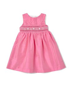 Style # FK-TM946 A beautiful and classy smocked dress - perfect for any occasion when your little princess is sure to be the star of the show. Order this and other girl smocked outfits online from Fantaisie Kids today *Made with silk viscose blend. * Dry Clean * T-Length *Imported Fitted Smock Dress For Party, Pink Smocked Bodice Dress For Dress-up, Pink Dress With Smocked Bodice For Dress-up, Fitted Dress With Smocked Cuffs For Party, Elegant Smocked Dress With Fitted Bodice, Elegant Pink Dress With Smocked Cuffs, Elegant Pink Dress With Smocked Back, Elegant Pink Dress With Smocked Bodice, Elegant Sleeveless Smock Dress