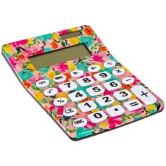 a colorful calculator with flowers and numbers on the front, sitting on a white background