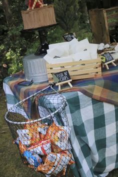 a table with some baskets and food on it