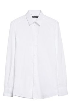 Channel a trim, tailored aesthetic in this cotton button-up shirt that features a crisp point collar and long sleeves. 30 1/2" length (size 40) Front button closure Point collar Long sleeves with button cuffs 100% cotton Dry clean or machine wash, line dry Made in Italy Men's Designer Clothing Timeless Long Sleeve Dress Shirt For Daywear, Timeless Long Sleeve Dress Shirt With Concealed Placket, Timeless Long Sleeve Shirt With Placket, Timeless Long Sleeve Dress Shirt With Button Cuffs, Long Sleeve Cotton Dress Shirt With Concealed Placket, Cotton Dress Shirt With Concealed Placket, Timeless Long Sleeve Cotton Shirt, Cotton Long Sleeve Dress Shirt With Hidden Button Closure, Cotton Dress Shirt With Hidden Button Closure