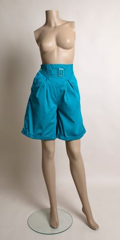 FREE DOMESTIC SHIPPING! <3♥ Super fun pair of 1990s turquoise blue high waist shorts! ♥ They button close on the side! Fun buckle on the front waist, which serves no purpose other than looking adorable! ;)♥ Very high waisted! Wide legs that have a flare to them (I pulled them into a point on the back shot)♥ Front pleats. Has side pockets on both sides, as well as back pockets. ♥ Great vibrant turquoise aqua blue color! ♥ In great condition! There's some color bleed onto the tags and pocket li 1950s Skirt, Hourglass Dress, Aqua Blue Color, High Waist Shorts, Wiggle Dress, Aquamarine Blue, Wide Legs, Unique Dresses, Favorite Dress